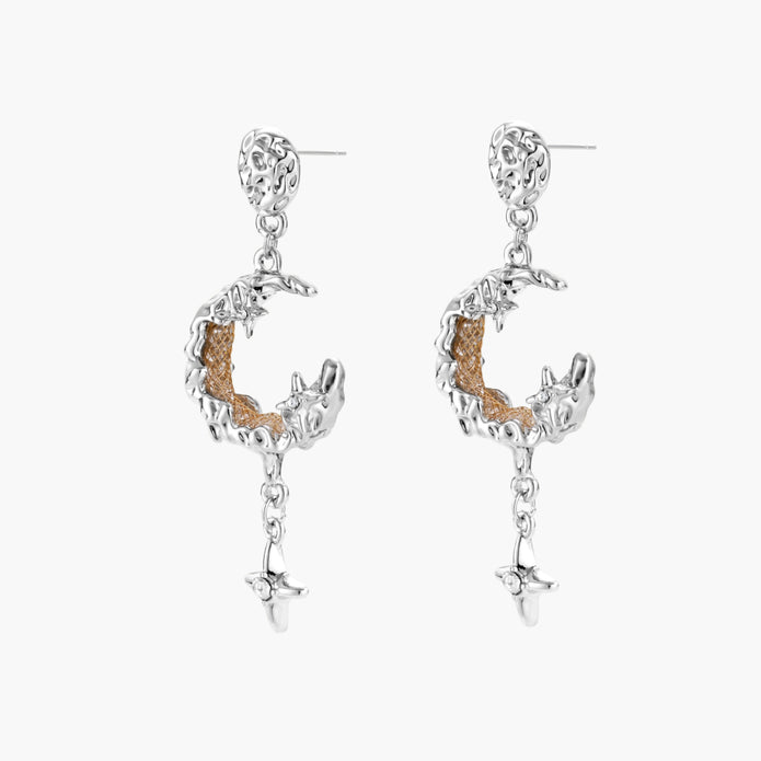 Detailed eco-brass dangle earrings featuring crescent moons with gold rope details and dangling star charms on white background.
