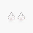 Silver mountain outline studs with baroque pearl and diamond accent on white background