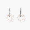 Rhodium-plated silver hoop earrings with freshwater pearls arranged in crescent formation and diamond accents