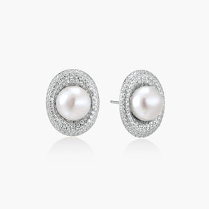 Elegant stud earrings with cream freshwater pearls surrounded by sparkly pavé crystals on rhodium-plated silver setting