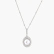 Oval sterling silver pendant with crystal halo surrounding a white freshwater pearl on delicate chain