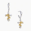 Two-tone silver and gold-plated cross drop earrings with rose motifs and zirconia stones on a huggie hoop base.