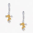 Two-tone silver and gold-plated cross drop earrings with rose motifs and zirconia stones on a huggie hoop base.