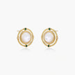 Circular gold stud earrings with iridescent mother-of-pearl center and green zirconia accents on cream background.