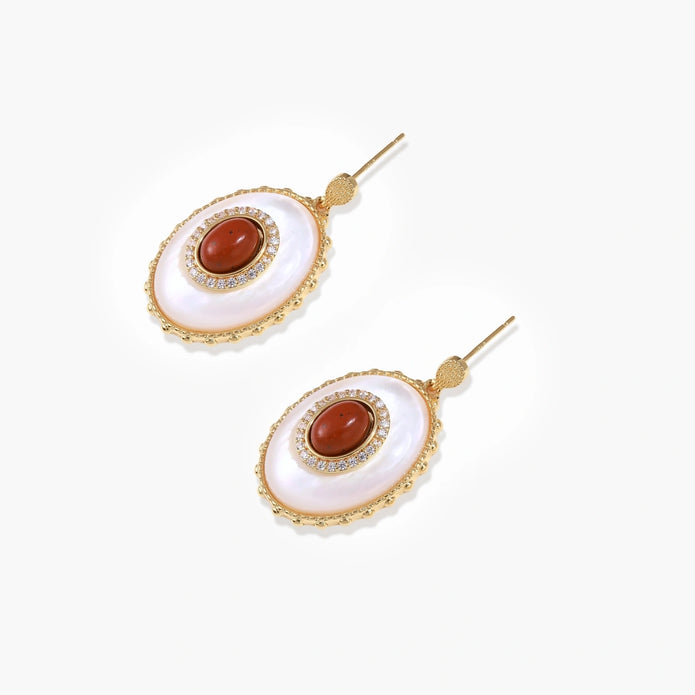 Gold-plated drop earrings with layered oval mother-of-pearl and cognac gemstone center framed by crystal halo