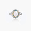Vintage-style cocktail ring with luminous cat's eye center stone surrounded by turquoise and crystal double halo on white gold plated band