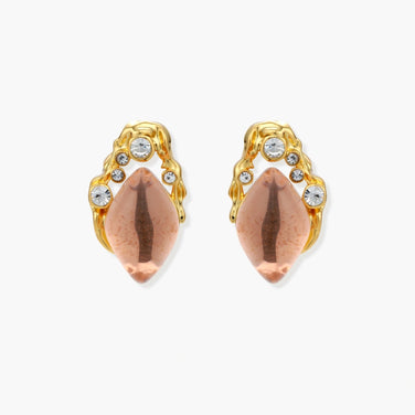 Gold-plated baroque stud earrings with coral-pink liuli stones and cubic zirconia crystals on white background.