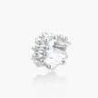 Wide band ring with sculptural wave ripples in polished white gold plated eco-brass on cream background