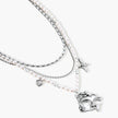 Ornate silver-toned masquerade mask jewelry set featuring rhinestone details and pearl drop earrings on white background.