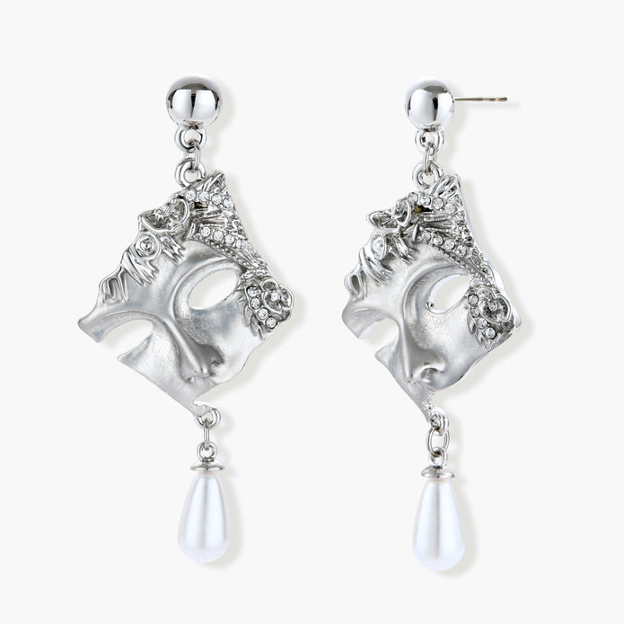 Ornate silver-toned masquerade mask jewelry set featuring rhinestone details and pearl drop earrings on white background.