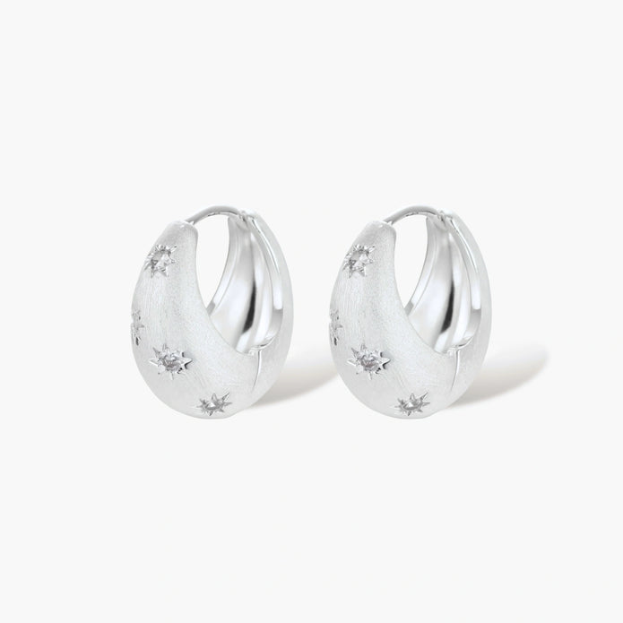 Silver-plated hoop earrings with star cutout designs, shown open and closed on white background, 17mm diameter.