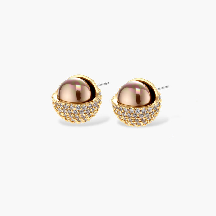 Elegant spherical pendant necklace and earrings set featuring crystal-pavé bottom half in gold or silver finish on white background.