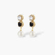 Gold-plated jewelry set with alternating black and clear cubic zirconia stones, featuring necklace, earrings and bracelet